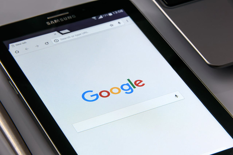 cell phone screen with the Google home page open